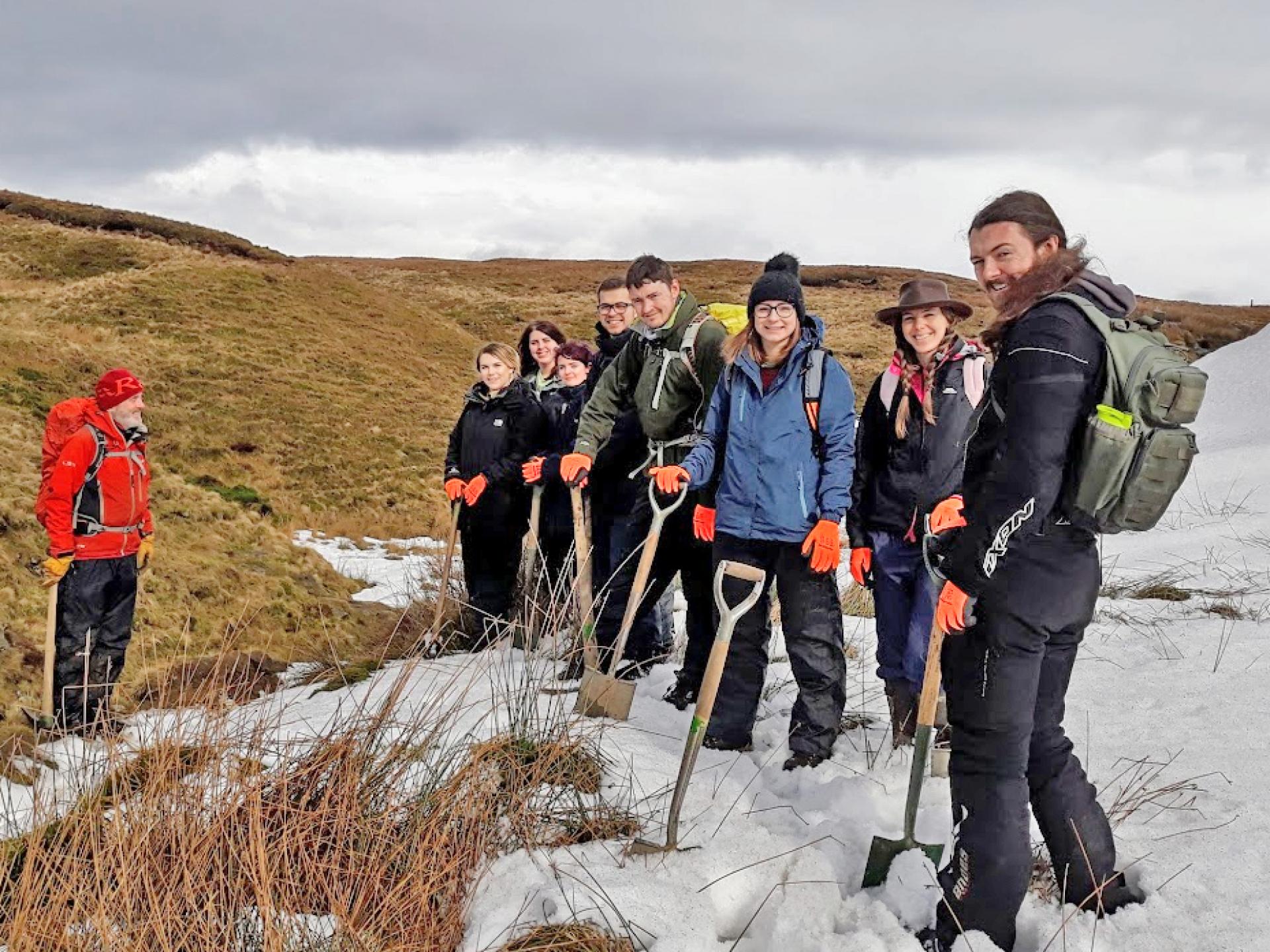 Contours Charity Team out with spades in the Peak District